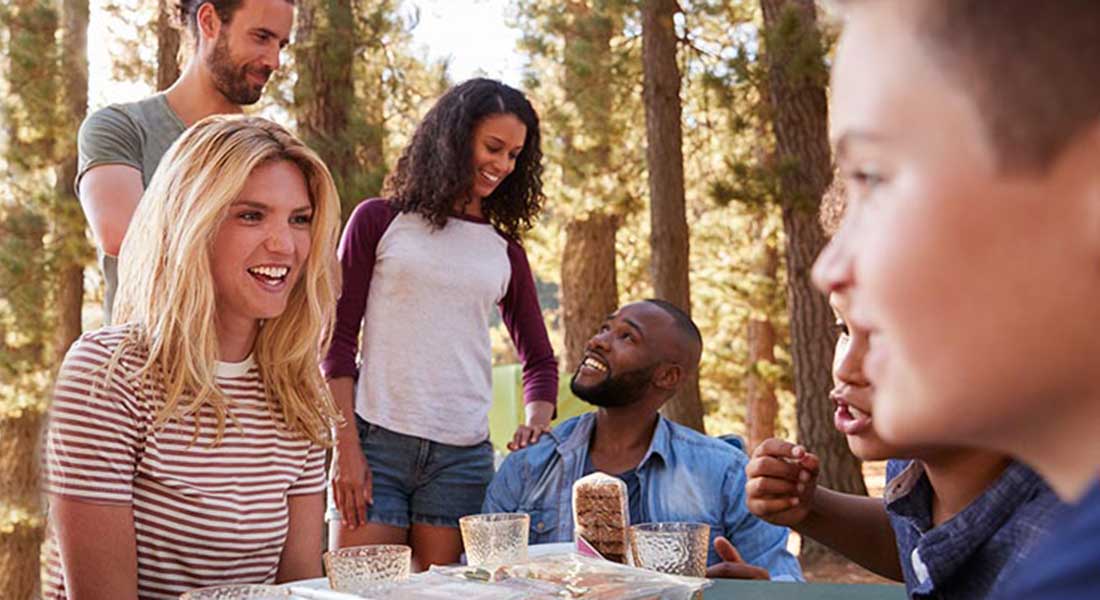 family with friends camping